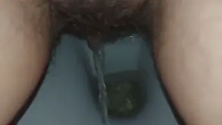 Hairy European MILF Pisses and Wipes Her Wet Pussy Solo