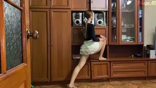Redhead Teases in Miniskirt Before Revealing Tan Pantyhose
