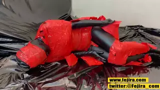 Asian Woman Bound in Latex Experiences Toy Orgasm