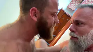 Stepdad and Stepson Share a Rough Bareback Threesome