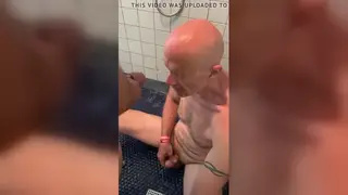 Muscle Studs Share Piss and Blowjobs in a Public Bathroom