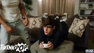 Muscular Hunk Feeds Thick Cock to Eager Twink Gamer