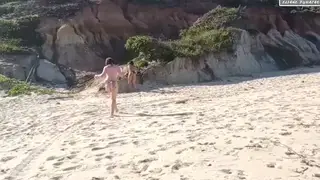 Blonde and Brunette Share a Bald Stud on the Beach