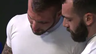 Mature European Doctor Examines Patient in Clinic