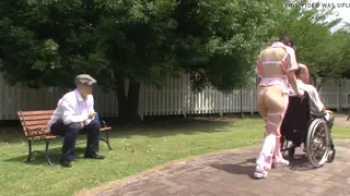 Japanese Caregiver Enjoys Outdoor Fun with Older Partner