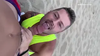 European Men Share Oral Fun on Public Beach