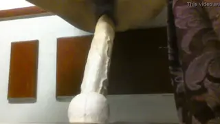 Solo Guy Rides a Rotating Dildo Until He Shakes