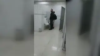 Latino Guy Explores a Station Platform