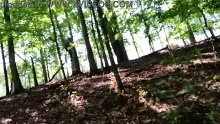 Outdoor Exhibitionist Gives Sloppy Deepthroat in Forest