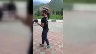 Arab Hunk Performs a Sensual Street Dance Outdoors