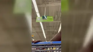 Ebony MILF Flashes Heavy Natural Tits in Store Aisles