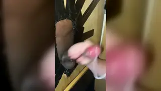 White Guy Worships Massive Black Cock Through Gloryhole