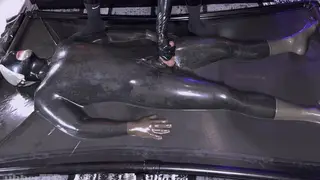 Bound Twink Endures Latex Bondage and Machine Play