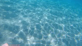 Redhead BBW Enjoys Underwater Foot Tease at Public Beach