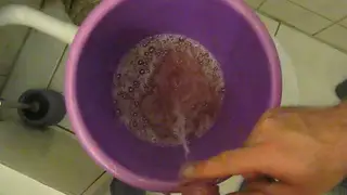 Muscular European Couple Turn a Bucket Into a Piss Playground