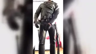Black Master Commands in Leather Domination Scene