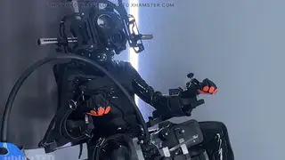 Rubber Drone Milked by Machine in Latex Bondage