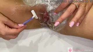 Blonde Shaves Her Hairy Bush in Close-Up POV