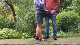 Voluptuous Mature Woman Strokes Her Lover Outdoors in Leather Skirt