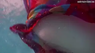 European Brunette Flaunts Curves Underwater in Lingerie