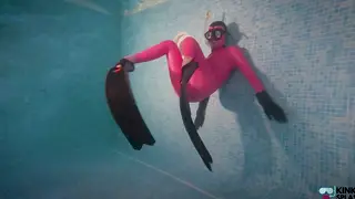 European MILF Teases Poolside in Shiny Latex
