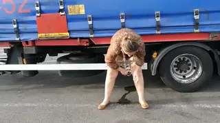 European MILF Enjoys Pissing Play in Short Clip