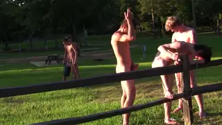 Muscular Teens Engage in Outdoor Gangbang Orgy