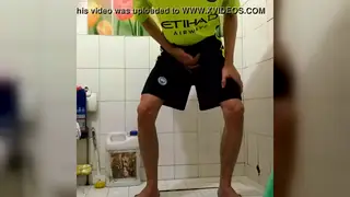 Asian Athlete Wets His Shorts After a Gym Session