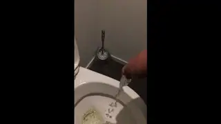 Slow-Motion Piss Stream Fills Bathroom in Fetish Clip