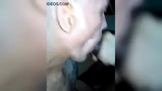 Uniformed Prisoner Handles a Thick Shaft