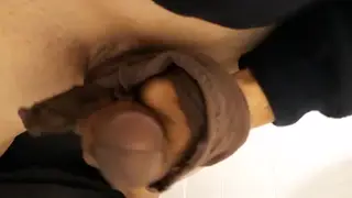 Guy Coats Coworker's Stockings at Desk