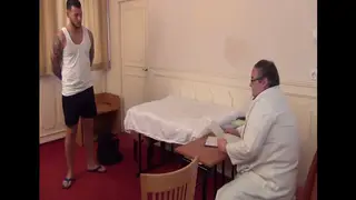 Tattooed European Stud Jerks Uncut Cock in Clinic
