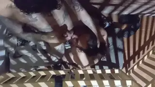 Tattooed Submissive Serves Dominant Neighbor in Cage
