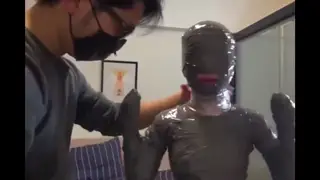 Asian Teen Submits To Tape Bondage Play