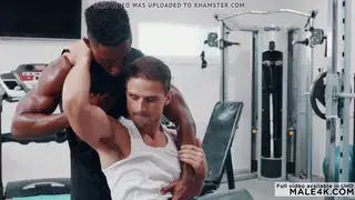Muscular Black Stud and White Partner Share Interracial Blowjob