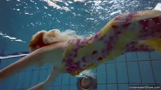 Petite Blonde Teen Swims Nude in Outdoor Pool