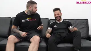 Muscular Latino Joins Tattooed Friend for Blowjob