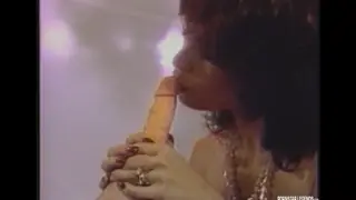 Vintage Brunette Deep-Throats a Dildo Before Toy Play