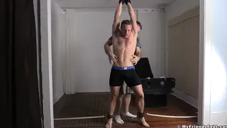 Muscular Stud Tied Down and Tickled on His Feet