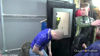 Latex-Clad Guys Trade Handjobs and Oral in Boots