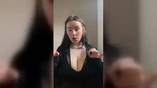 British Student Reveals Voluptuous Figure in Striptease