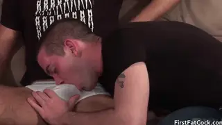 Two Men Trade Oral Pleasure in a Sunlit Room