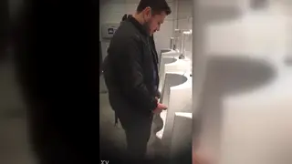 Hung Guy Unleashes a Golden Stream in Close-Up