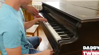 Older Man Guides a Twink Through Oral in a Piano Room