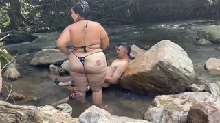Busty Latina Rides Hard on a Riverbank in Fishnets