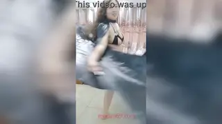 Mature Woman Dances Seductively in Home Setting