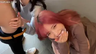 Asian Teen Handles Two Cocks in a Wild Group Session