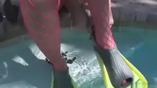 Busty MILF Strips Out of Pantyhose Underwater
