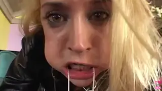 Blonde in Stockings Handles Two Cocks at Once