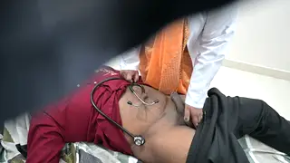 Indian Nurse Gives a Hands-On Exam in the Clinic